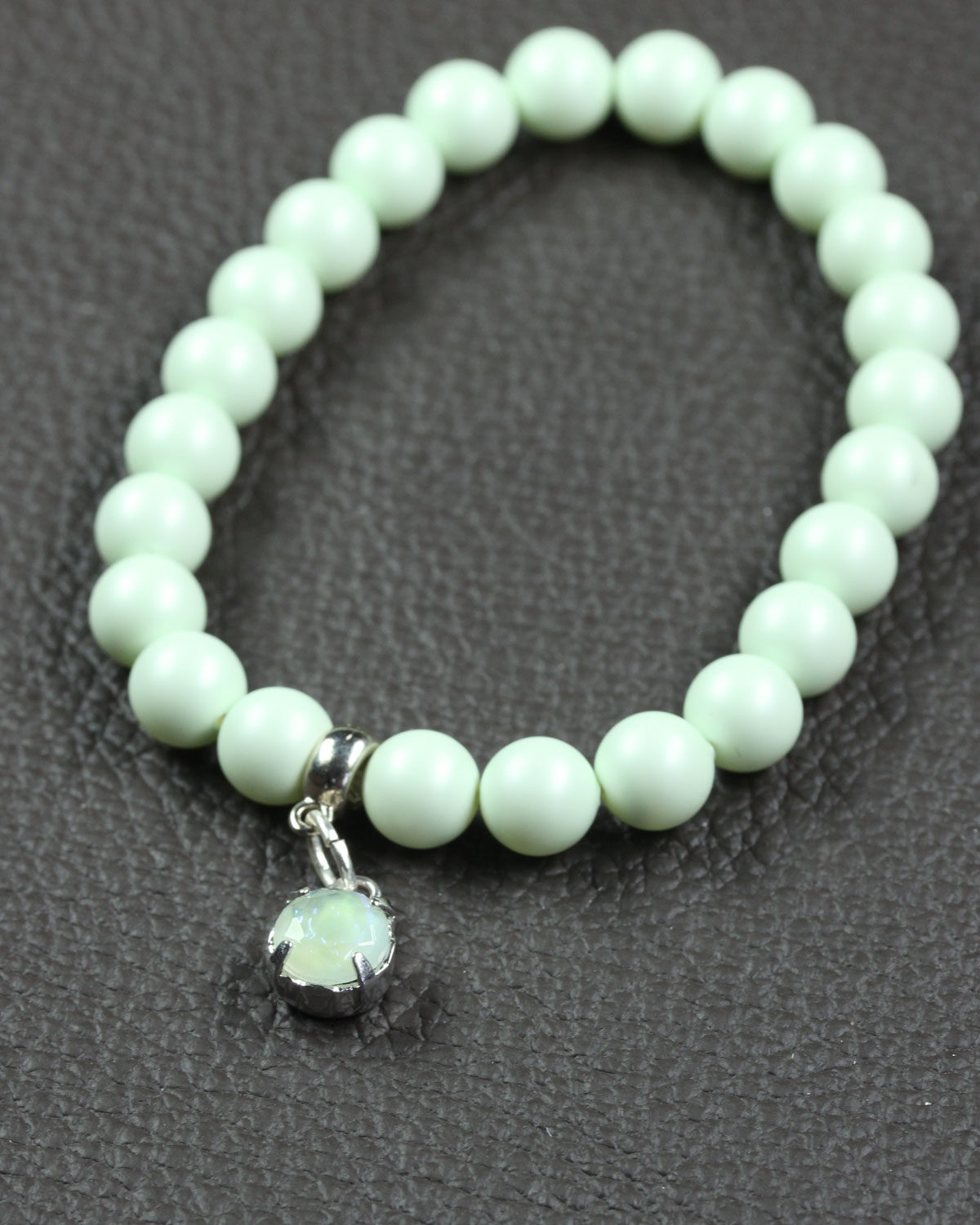 Pastel green swarovski bracelet with glass charm