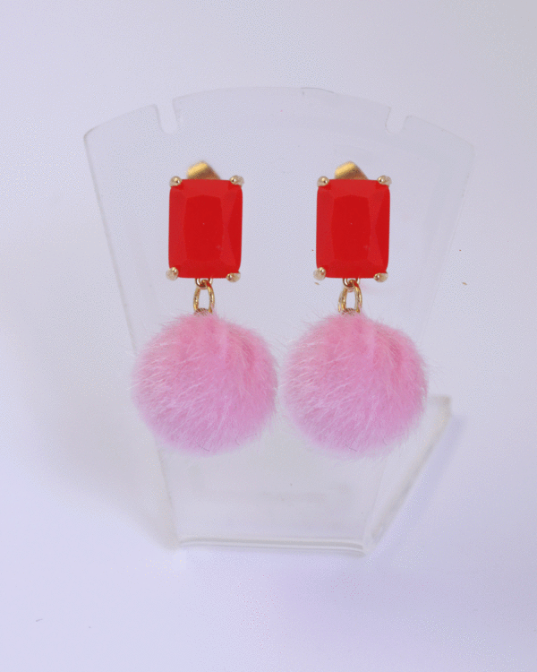 pink pompom and red stud earrings